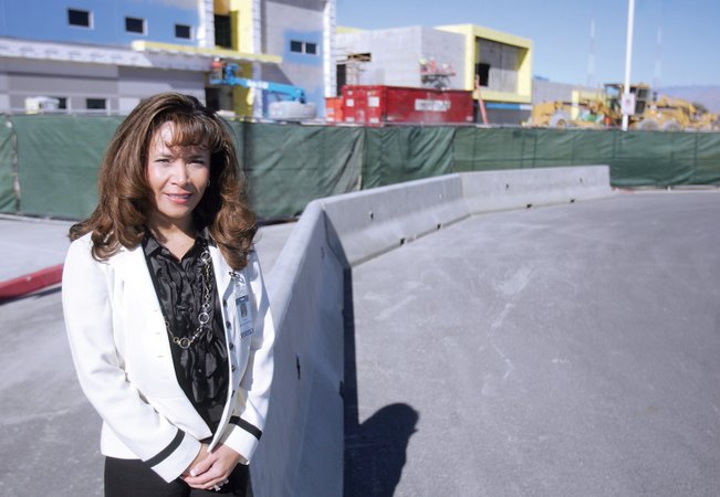 Tammy Boffelli, principal of Veterans Tribute Career and Technical Academy, stands in front of the school’s new site, due to be completed in August. The new public high school will focus on education for law enforcement officers, paramedics and crime scene investigators.