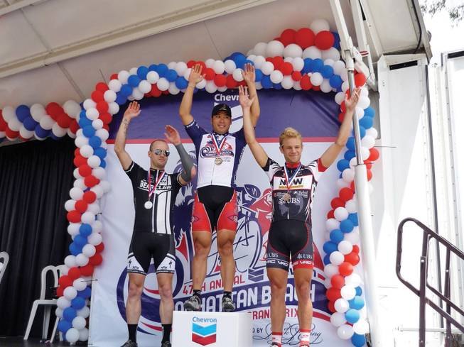 Danny Kam, center, is starting his second season of full-time bicycle racing. Last year, he won 12 event sponsored by the Southern California/Nevada Racing Association.