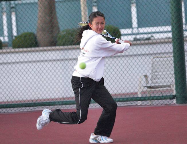 Kimberly Yee, 12, won the USTA National Winter Championships sportsmanship award in December. She is shown practicing at the Las Vegas Hilton.