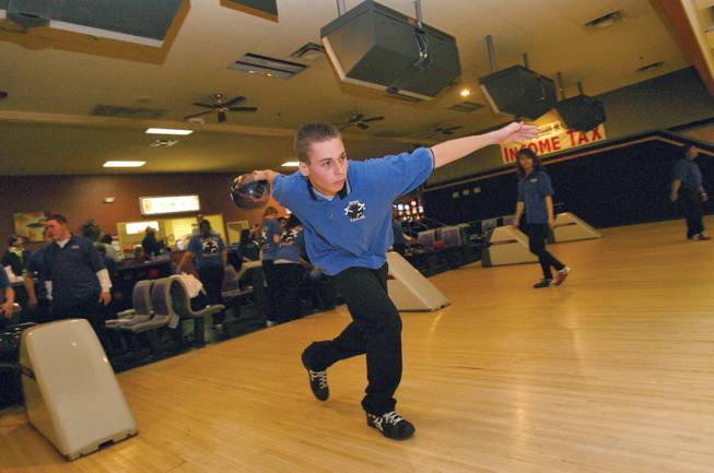 Boulder City sophomore Jesse Fickas, 16, throws his ball during a bowling meet against Desert Pines on Feb. 5.
