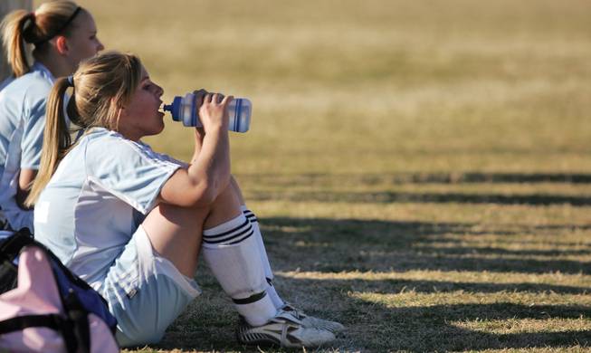 Kim Callen, a freshman on Foothill's girls' soccer team, sits on the sidelines as she watches her team compete against Southeast Career and Technical Academy on Feb. 3. Callen plays goalkeeper for her club team but has had success as a midfielder for Foothill.
