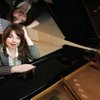 Masha Pisarenko began playing the piano at age 5 in a small town in Siberia. She performed extensive