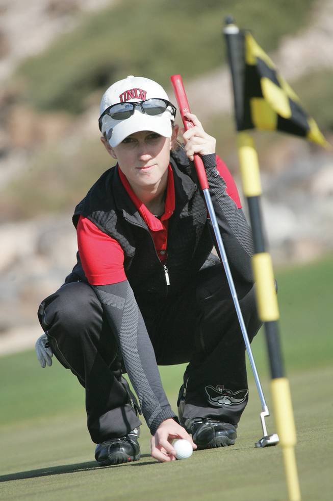 UNLV freshman Bethany Glassford lines up a putt during a practice round at the Rio Secco Golf Club.