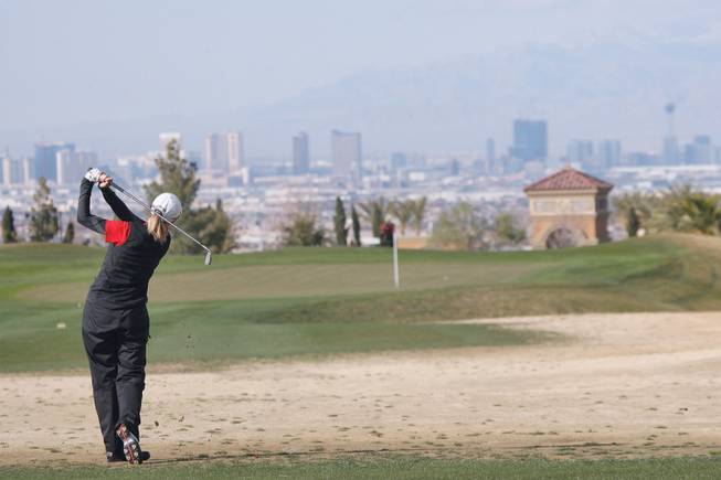 UNLV freshman Bethany Glassford drives her ball during a practice at the Rio Secco Golf Club.