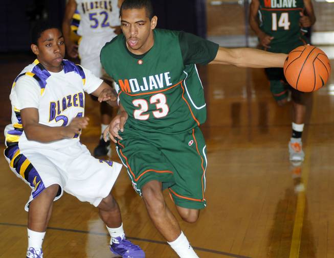 Anthony Marshall dribbles up the court last winter during his senior year at Mojave High in North Las Vegas. Marshall was the state's Gatorade Player of the Year.