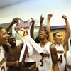Eldorado players celebrate in the locker room after defeating Liberty 57-56 in a last minute, come-from-behind victory in the Sunrise Regional finals at Liberty Friday.