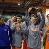 The Bishop Gorman Gaels celebrate winning the boys 4A Sunset Regional trophy with their win against Palo Verde High School on Friday.