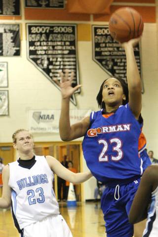 Bishop Gorman guard Yahindra Edwards goes for the basket against Centennial during the girls Sunset Regional championship game at Palo Verde High School on Friday.