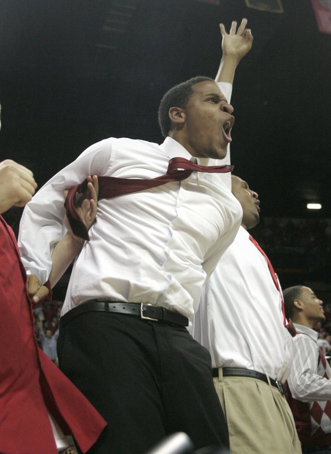UNLV redshirt Steve Jones cheers as Kendall Wallace scores his second three point in a row against BYU during the second half of their Mountain West Conference game Saturday, Feb.  21, 2009, at the Thomas & Mack Center in Las Vegas. UNLV held off a late BYU rally to win 75-74. 