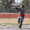 Sophomore LaShante Ellison spins for the hammer throw during track and field practice at UNLV.