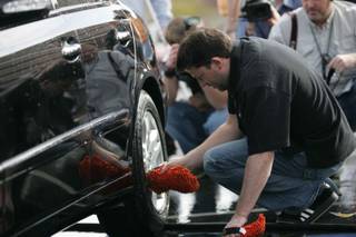 Two-time NASCAR Cup champion Tony Stewart volunteered his time washing cars at Coronado High School to help raise money for the school's racing program Thursday.