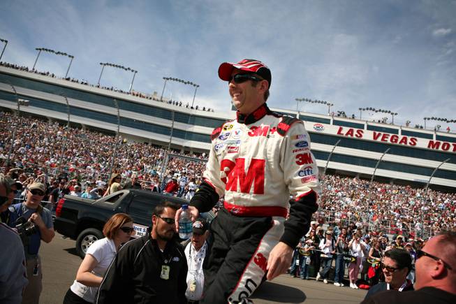 Racer Greg Biffle is introduced before the start of the Shelby 427 NASCAR Sprint Cup Series race at the Las Vegas Motor Speedway in Las Vegas on Sunday.