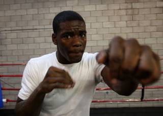 Hasim Rahman Jr. shadow boxes as he trains at Barry's Boxing in Las Vegas. 