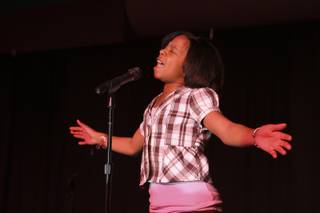 Carrington Peterson, 10, kicks off the 5th Annual Gospel Fest singing 