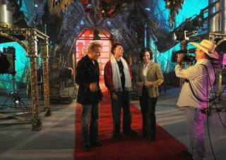 Siegfried & Roy and ABC anchor Elizabeth Vargas inside S&R's warehouse of magic tricks.