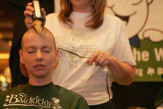 Vanessa Coleman gets her head shaved to help raise funds for St. Baldrick's Foundation in Quinn's Irish Pub at Green Valley Ranch.