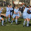 The Centennial High School Bulldogs race out to congratulate Julie Owens, No. 11, after scoring her game winning second goal on a free kick. The Bulldogs took a 2-0 victory over Bishop Gorman at the Sunset Regional championship held at the Bettye Wilson Soccer Complex on Monday.