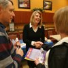 North Las Vegas mayoral candidate Shari Buck, center, talks with Wayne and Barbara Headrick during a meeting with Sun City Aliante residents at the Sun City Aliante community center Tuesday.