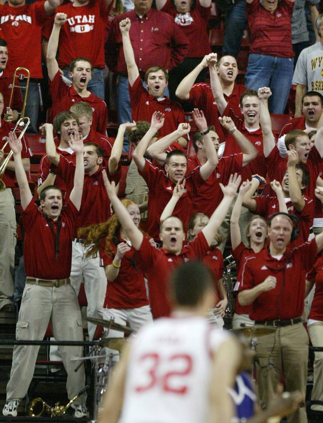 Utah fans celebrate a last-second three point basket by Lawrence Borha during their game against TCU at the Mountain West Conference Basketball Championships Thursday, March 12, 2009.  Utah won the game 61-58.