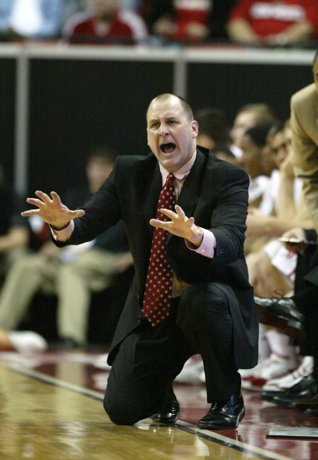 Utah coach Jim Boylen tells his team to calm down during their game against TCU at the Mountain West Conference Basketball Championships Thursday, March 12, 2009.  Utah won the game 61-58 on a last-second three point shot. 