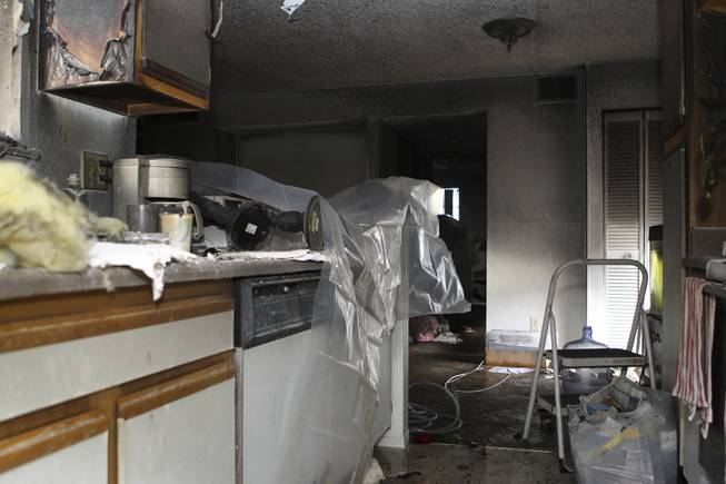Excessive fire damage was caused to Jonathan Arberg's apartment Thursday morning at the Crossing Apartments, 2312 North Green Valley Parkway in Henderson.