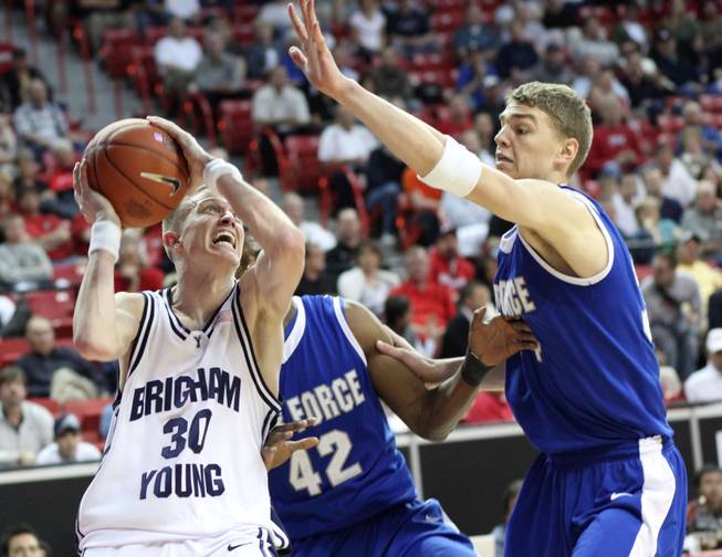 Lee Cummard takes it up strong against the defense  as Air Force takes on BYU on Thursday in the Mountain West Conference tournament at the Thomas & Mack Center.