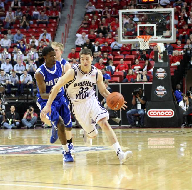 Jimmer Fredette dribbles around the defense as Air Force takes on BYU on Thursday in the Mountain West Conference tournament at the Thomas & Mack Center.
