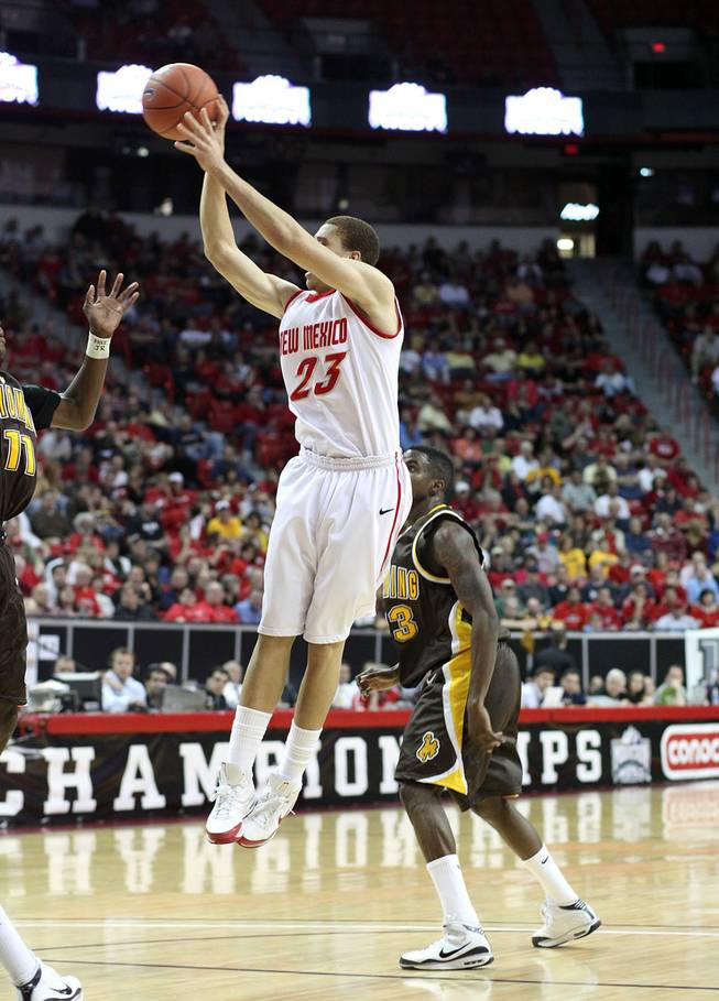 Phillip McDonald shoots a jumper as New Mexico takes on Wyoming on Thursday in the Mountain West Conference tournament at the Thomas & Mack Center. 