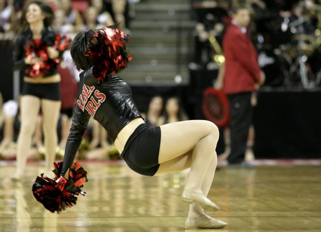 A Rebel Girl performs during a break in the action as UNLV takes on San Diego State on Thursday in the Mountain West Conference tournament at the Thomas & Mack Center. The Rebels fell for the third time this season to the Aztecs, 71-57.