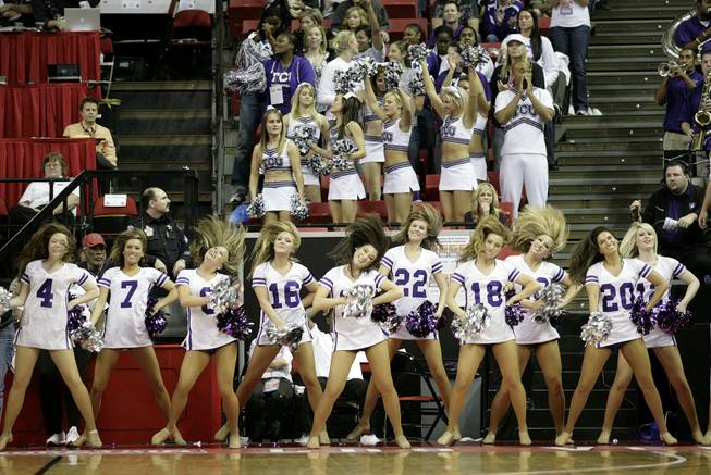 The TCU cheerleaders cheer on their team as Utah takes on TCU on Thursday in the Mountain West Conference tournament at the Thomas & Mack Center. Utah eeked out the win 61-58.