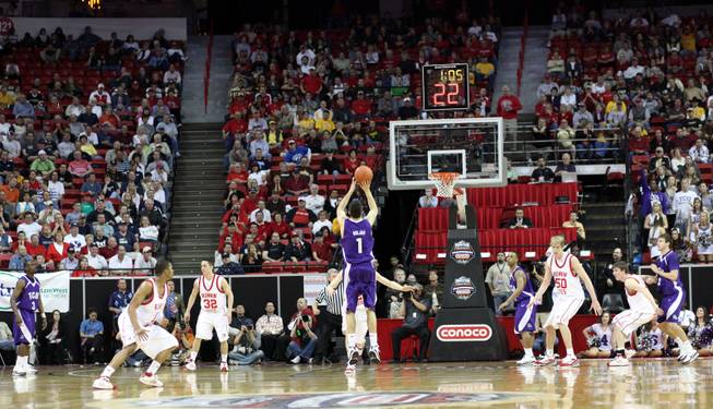 Zvonko Buljan shoots a late jumper to put his team ahead only to lose on the next possession on a Utah three as Utah takes on TCU on Thursday in the Mountain West Conference tournament at the Thomas & Mack Center. Utah eeked out the win 61-58.