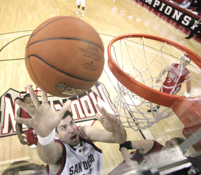 San Diego State senior center Ryan Amoroso grabs a rebound Thursday in his team's 71-57 win against UNLV in the Mountain West Conference tournament at the Thomas & Mack Center.