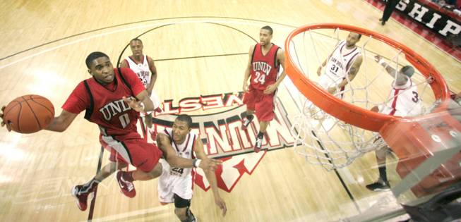 UNLV guard Oscar Bellfield soars toward the basket against San Diego State at the Mountain West Conference Basketball Championships Thursday, March 12, 2009.  San Diego State won the game 71-57. 