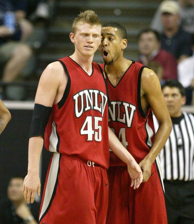 UNLV guard Rene Rougeau talks to forward Joe Darger during their game against San Diego State at the Mountain West Conference Basketball Championships Thursday, March 12, 2009.  San Diego State won the game 71-57. 