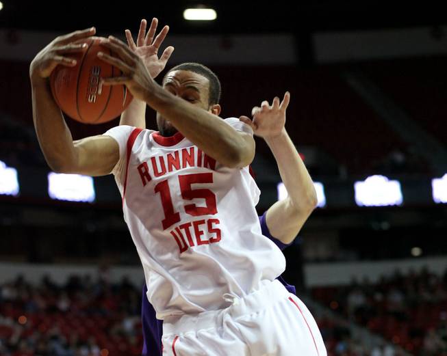 Carlon Brown pulls down a rebound as Utah takes on TCU on Thursday, March 12, 2009 in the Mountain West Conference tournament at the Thomas & Mack Center. 