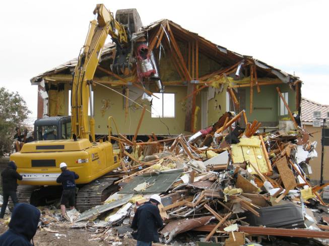 The Cerda family's house is demolished for ABC's "Extreme Makeover: Home Edition" filming in Las Vegas this week.