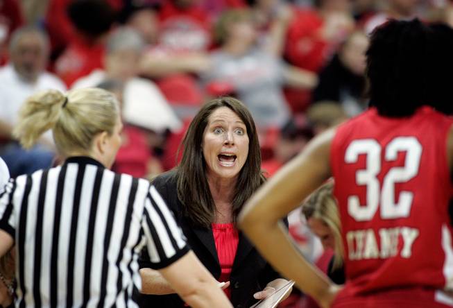 UNLV head coach Kathy Olivier yells to the team on the floor during the game against Texas Christian University on Wednesday during the quarterfinals of the Mountain West Championship at the Thomas & Mack Center.