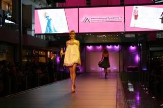 A model takes to the catwalk at the Barbie Fashion Show at Fashion Show Mall Saturday. All of the pieces were designed by students from the International Academy of Design and Technology of Las Vegas.
