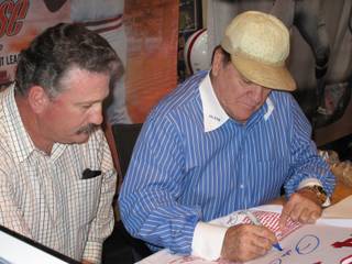 Pete Rose signs a jersey for John Goulart, of Fresno, Calif.  Rose has been a regular in Las Vegas, signing autographs at Field of Dreams inside the Caesars Forum Shops 15 days a month.