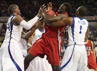 Brice Massamba battles for a rebound as UNLV takes on the Kentucky Wildcats in Lexington, Ky., Tuesday night in the first round of the NIT. The game was played in Memorial Coliseum.