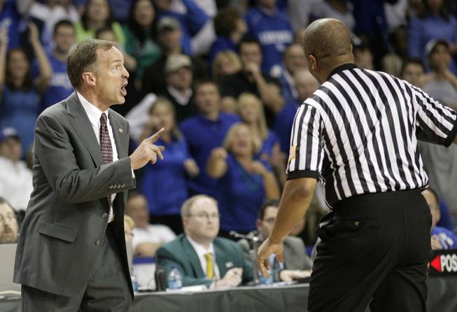 Lon Kruger argues a call as UNLV takes on the Kentucky Wildcats in Lexington, Ky., Tuesday night in the first round of the NIT. The game was played in Memorial Coliseum, the first men's game played there since 1976. 