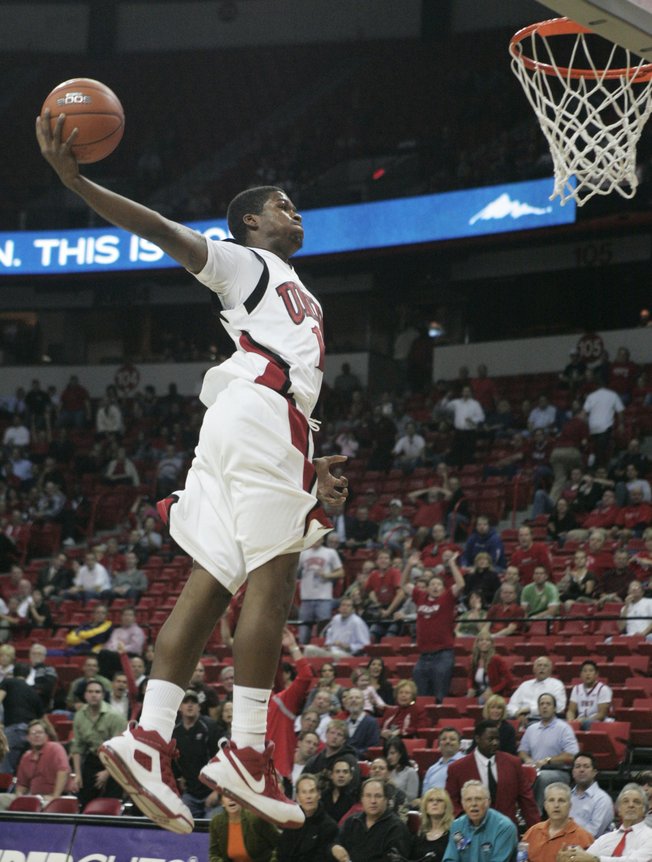 UNLV's DeShawn Mitchell flies in for an uncontested slam dunk in the final minutes of a 25-point win against Texas-Pan American on Nov. 18 at the Thomas &amp; Mack Center. 