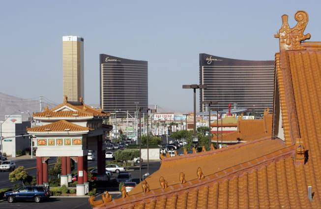 Strip casinos contrast with Asian architecture in this view from the Chinatown Plaza on Spring Mountain Road. 