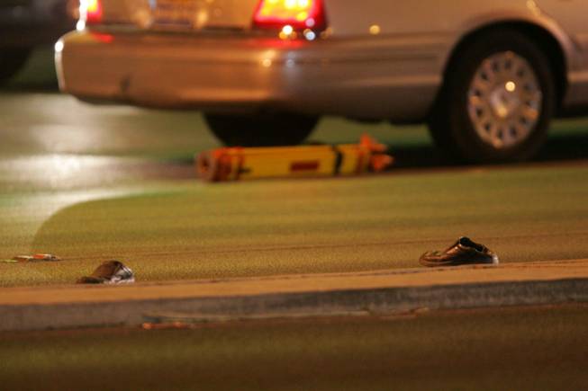 Metro Police are investigating a hit-and-run accident that left a woman in critical condition Wednesday night. Shoes were left behind at the scene of the accident. The woman, whose identity has not been released, was crossing Charleston Boulevard near Pecos Road when she was struck by a vehicle, police said.
