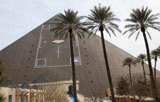 The new ad on the side of the Luxor, designed by Sky Tag, a building-wrap design firm, is modeled after a camera screen, with a recording light at the top and the 