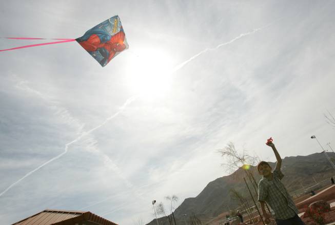 Oscar Toribio, 7, flies his kite during the grand opening of Shadow Rock Park in North Las Vegas Saturday, March 21, 2009.