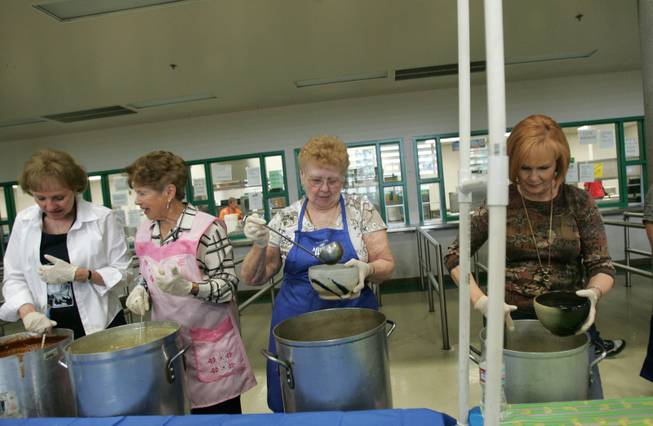 Volunteers serve-up soup during the Empty Bowl benefit luncheon at Green Valley High Saturday, March 21, 2009. Money raised during the event will be used to feed the homeless of Las Vegas. From left are Vivian Weber, Alma Strabala, Barbara Dempsey and Barbara Seed.
