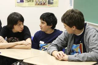 Freshmen, from left, Christopher Wang, Mex Asaf and Steven Gibson consult each other during their bonus question of the Latin Competitive Certamen during the third annual Convention of the Nevada Junior Classical League at The Meadows School on March 20, 2009.