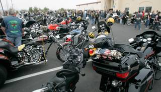 Bikers and their motorcycles fill the parking lot of Hope Baptist Church before a funeral for James 