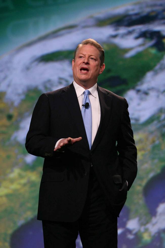 Former Vice President Al Gore speaks at the International CTIA Wireless show in Las Vegas. Gore says government investment in green infrastructure projects, including creation of a "smart," energy efficient electricity grid, will create jobs and help address the threat of climate change.